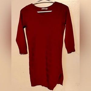 Size small long red shirt with angled lines for slimming effect